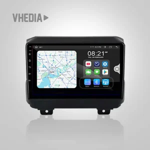 In-car infotainment system showing a navigation map on the left and app icons on the right, branded by Vhedia in the top left corner.