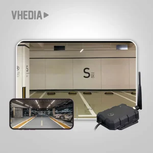 Smart parking system setup: rugged gateway device with an antenna, shown next to a smartphone displaying a parking garage image.