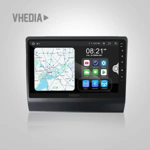Infotainment touchscreen in a car showing a map on the left and app icons on the right, time 08:21 AM, Vhedia branding.