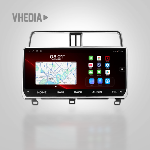In-car touchscreen infotainment system displaying a navigation map and app icons on a dark background, mounted in a chrome-framed dashboard unit.