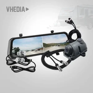 Vehicle dash camera kit with dual cameras and a coiled cable, laid over a rearview mirror display showing road footage; ideal for RV or truck rearview monitoring