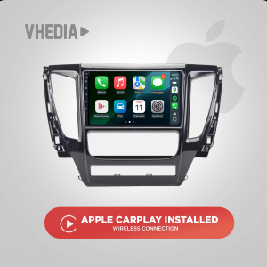 In-car infotainment head unit displaying Apple CarPlay apps with a red button beneath reading 'Apple CarPlay Installed – Wireless Connection'.